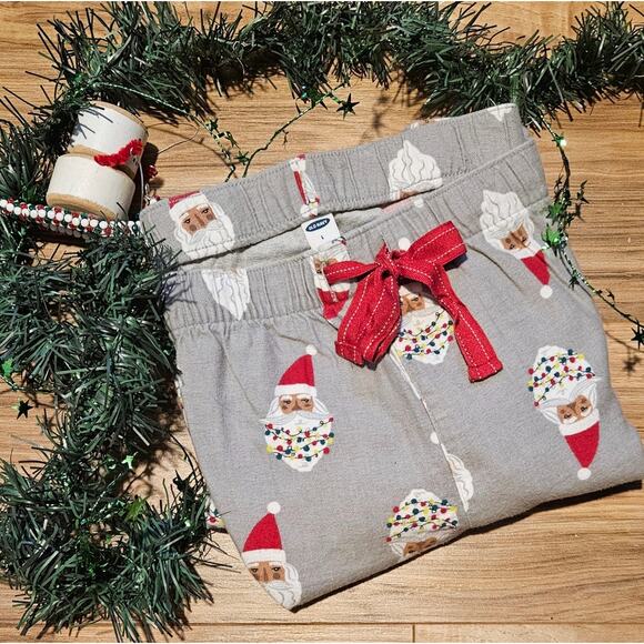 Woman's flannel pajama pj pants with Santa heads Size Lg - Picture 1 of 5